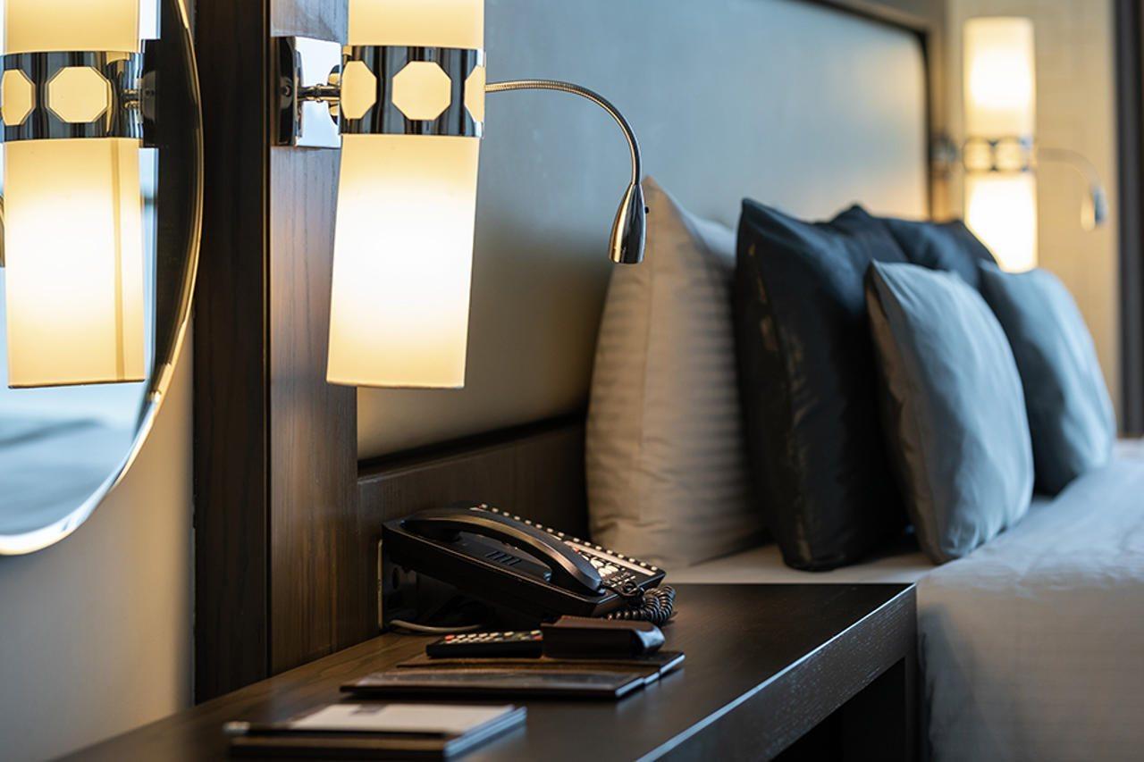 Royal M Al Aqah Beach Resort By Gewan Экстерьер фото A telephone in a hotel room