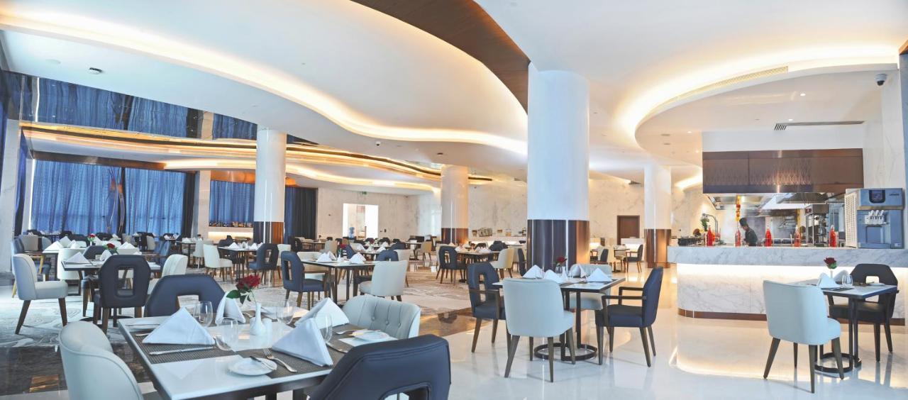 Royal M Al Aqah Beach Resort By Gewan Экстерьер фото The restaurant