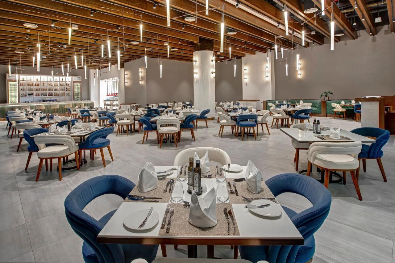 Royal M Al Aqah Beach Resort By Gewan Экстерьер фото The restaurant