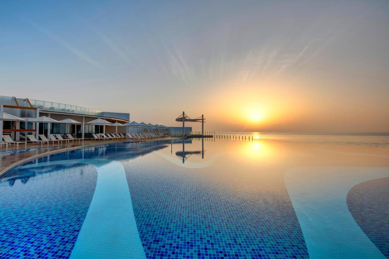 Royal M Al Aqah Beach Resort By Gewan Экстерьер фото Infinity pool at the Dead Sea